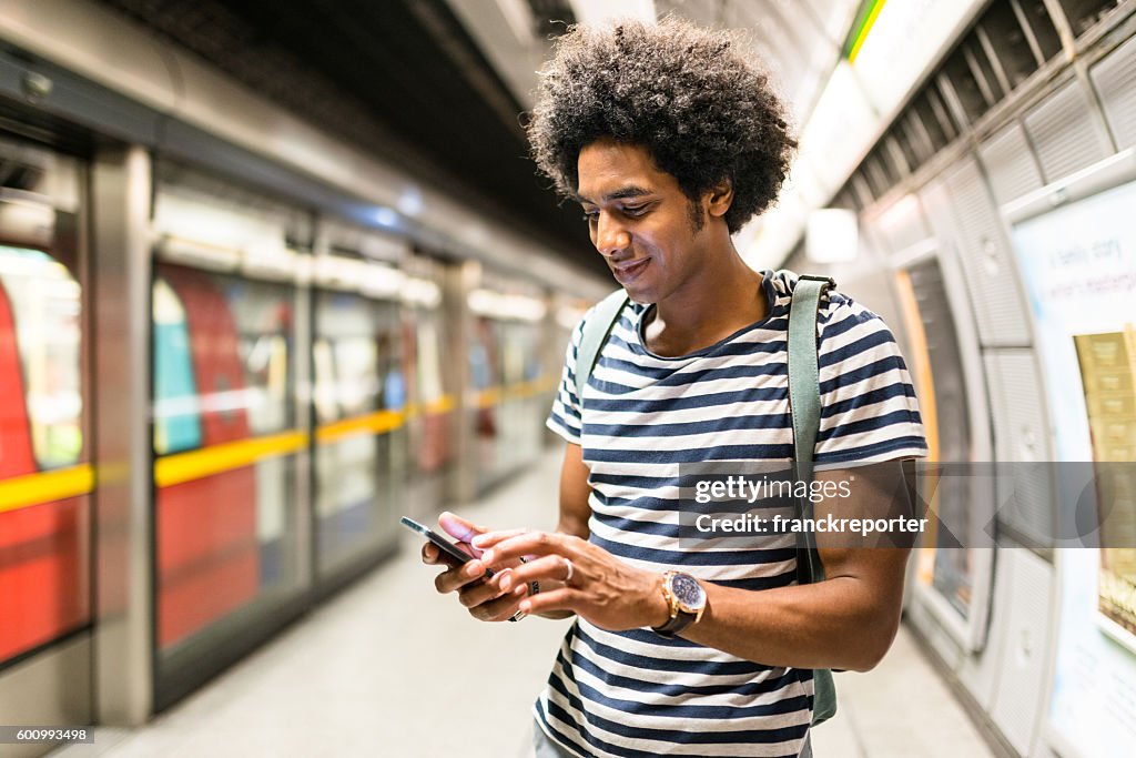 Solo traveler on a london station