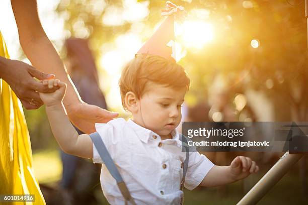 one year old boy on a party - number 1 mom stock pictures, royalty-free photos & images