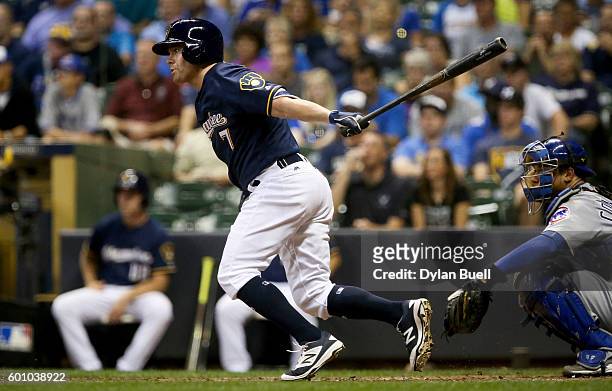 Jake Elmore of the Milwaukee Brewers hits a single in the sixth inning against the Chicago Cubs at Miller Park on September 7, 2016 in Milwaukee,...
