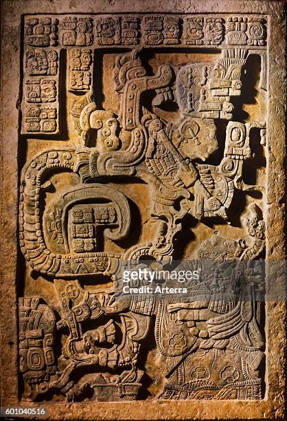 Sculpted Yaxchilan lintel 25 showing hieroglyphic inscriptions being reversed as if it were meant to be read in a mirror, Chiapas, Mexico.