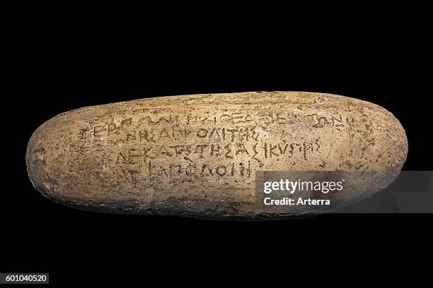 The Stone of Terpon / Pebble of Antibes / Galet d'Antibes with carved inscription in Ionic Greek, dated to between 450 - 425 BC.