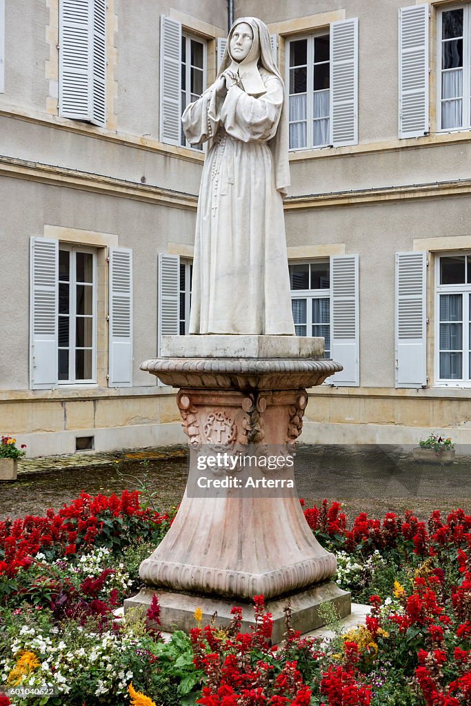 Statue of Bernadette Soubirous in the Espace Bernadette Soubirous at Nevers