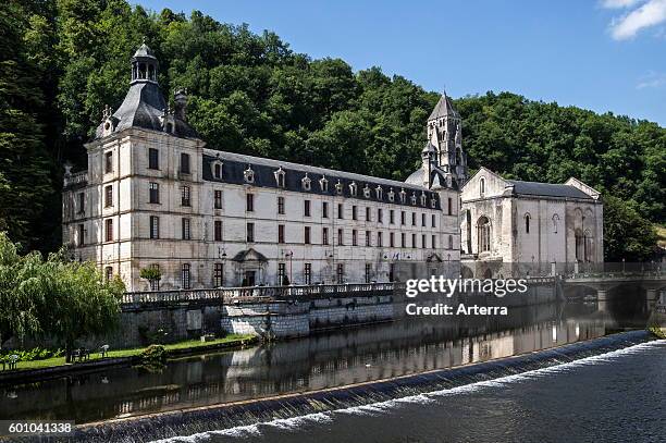 The Benedictine abbey abbaye Saint-Pierre de Brantome and its bell tower along the river Dronne, Dordogne, Aquitaine, France.