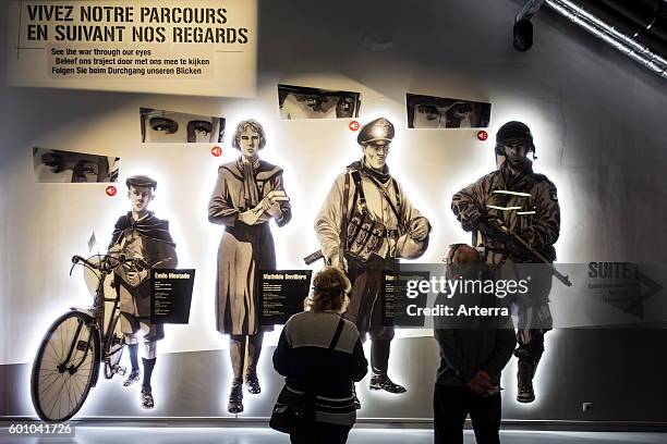 Tourists visiting the Bastogne War Museum devoted to the Second World War Two Battle of the Bulge in the Belgian Ardennes, Belgium.