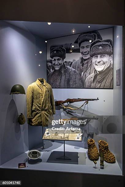 Russian uniform and arms in the Bastogne War Museum devoted to the Second World War Two Battle of the Bulge in the Belgian Ardennes, Belgium.