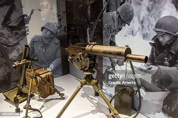 American M1917 Browning machine gun and M2 Mortar in the Bastogne War Museum devoted to the Second World War Two Battle of the Bulge in the Belgian...