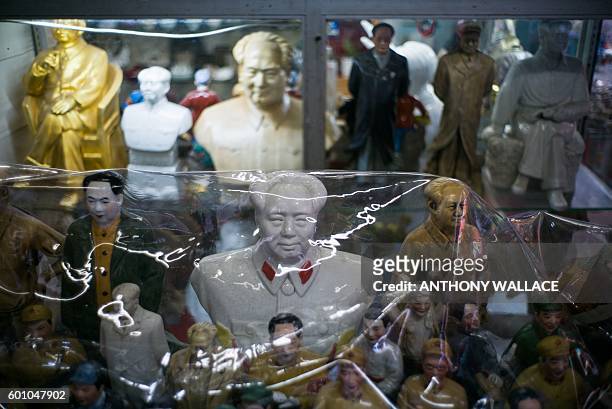 Busts of Mao Zedong are displayed at a stall in Hong Kong on September 9 which marks 40 years since Mao's death in 1976. Throngs of pilgrims lined up...