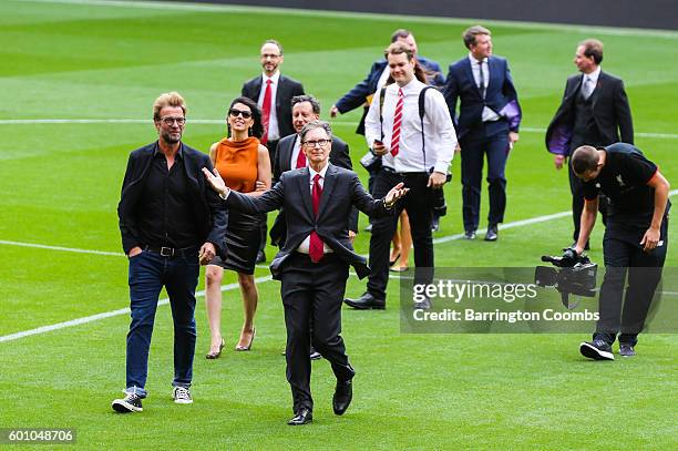 Liverpool's manager Jurgen Klopp and club owner John W Henry during the opening of the new stand and facilities at Anfield on September 9, 2016 in...