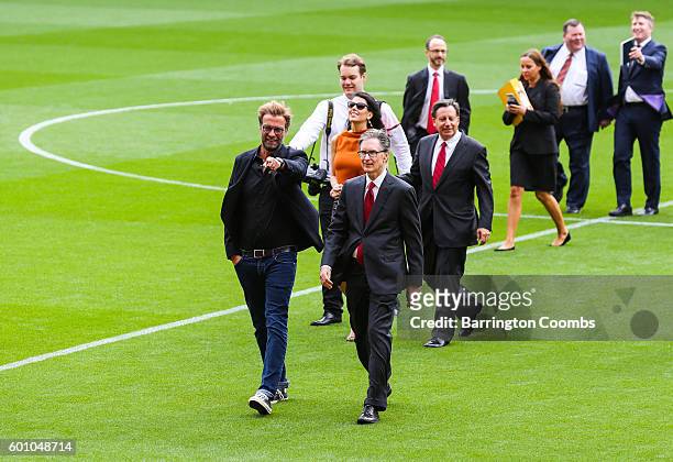 Liverpool's manager Jurgen Klopp and club owner John W Henry during the opening of the new stand and facilities at Anfield on September 9, 2016 in...