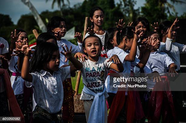 Some childern do traditional dance during Gejog Lesung festival in Yogyakarta, Indonesia, on September 9, 2016. Gejog lesung is traditional arts from...