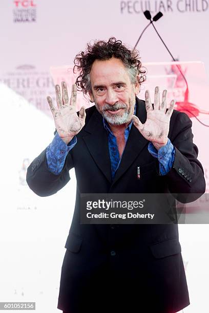 Director Tim Burton attends the Tim Burton Hand And Footprint Ceremony at TCL Chinese 6 Theatres on September 8, 2016 in Hollywood, California.