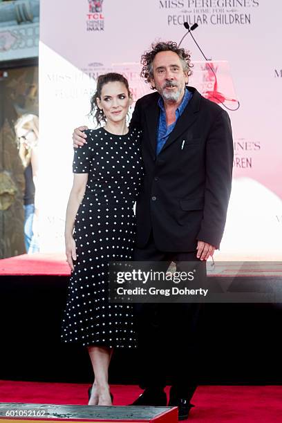 Actress Winona Ryder and Director Tim Burton attend the Tim Burton Hand And Footprint Ceremony at TCL Chinese 6 Theatres on September 8, 2016 in...