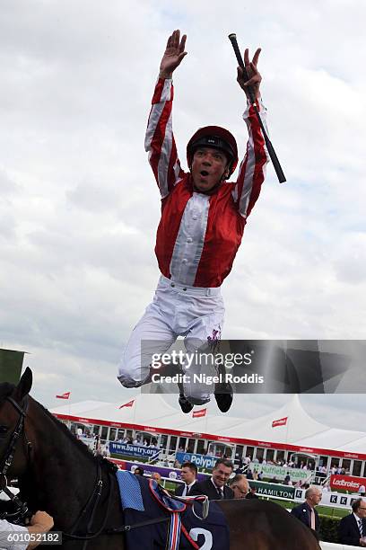 Frankie Dettori celebrates winning The Pepsi Max Flying Childers Stakes riding Ardad at Doncaster Racecourse on September 9, 2016 in Doncaster,...