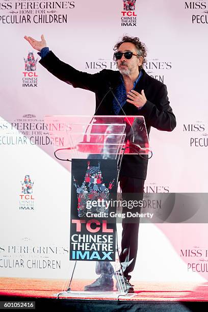 Director Tim Burton attends his Hand And Footprint Ceremony at TCL Chinese 6 Theatres on September 8, 2016 in Hollywood, California.