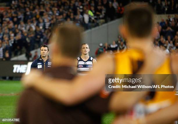 Chris Scott, Senior Coach of the Cats and Joel Selwood of the Cats look on as the National Anthem is played during the 2016 AFL Second Qualifying...