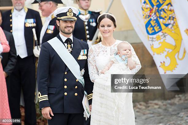 Prince Carl Philip, Princess Sofia and Prince Alexander attend the christening of Prince Alexander of Sweden at Drottningholm Palace Chapel on...