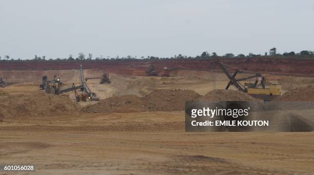 Machines are unmanned as Phosphate mining workers abandon their work site to demonstrate in the streets of Hahatoé, a mining village 40 kilometre...