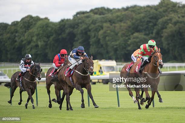 Dale Smith riding Raven Banner during The ApolloBET Home Of Cashback Offers Handicap at Haydock Park Racecourse on August 4, 2016 in Haydock, England.