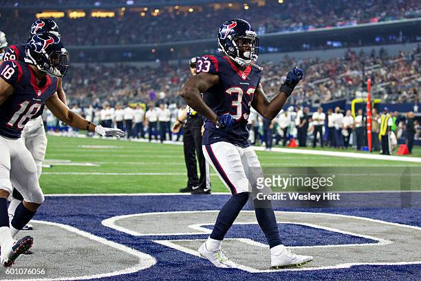 Akeem Hunt of the Houston Texans rushes for a touchdown and does a dance during a preseason game against the Dallas Cowboys at AT&T Stadium on...