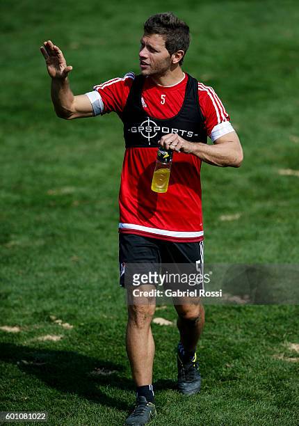 Nicolas Domingo of River Plate leaves the field after a training session at River Plate's training camp on September 09, 2016 in Ezeiza, Argentina.