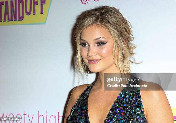 Actress Olivia Holt attends the premiere of "The Standoff" at Regal LA Live: A Barco Innovation Center on September 8, 2016 in Los Angeles,...