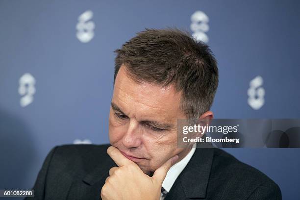 Peter Kazimir, Slovakia's finance minister, listens during a press conference following a meeting of European finance ministers in Bratislava,...
