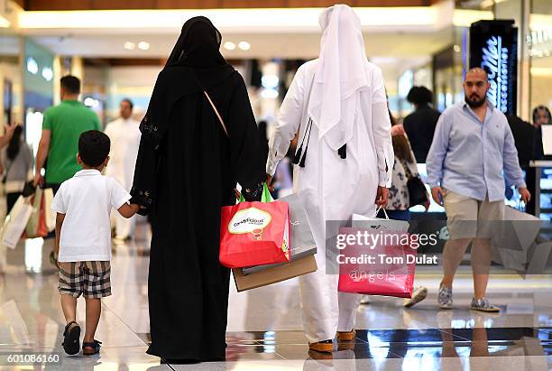 People enjoy shopping ahead of Eid celebrations on September 9, 2016 in Dubai, United Arab Emirates. Muslims across the world are preparing to...