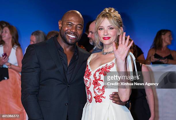 Sept. 9, 2016 : Director Antoine Fuqua and actress Haley Bennett pose for photos before the "The Magnificent Seven" premiere during the 41st Toronto...