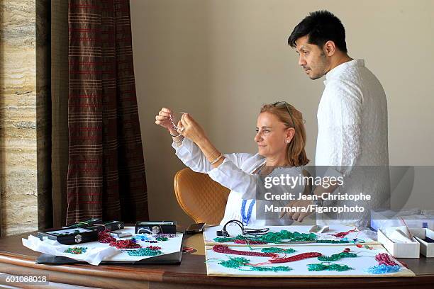 Lucia Silvestri, creative director at Bulgari is photographed evaluating Bulgari jewelry with Monsieur R. For Le Figaro on February 15, 2016 in...