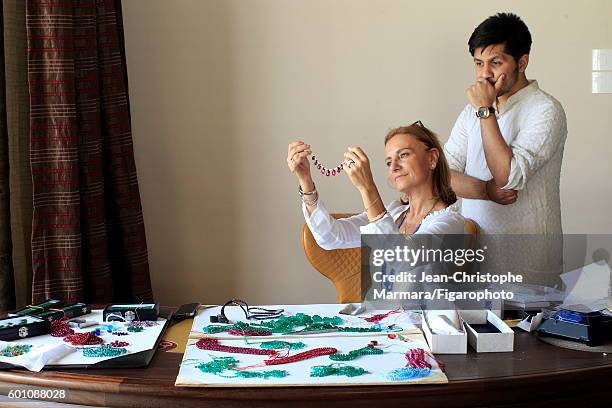 Lucia Silvestri, creative director at Bulgari is photographed evaluating Bulgari jewelry with Monsieur R. For Le Figaro on February 15, 2016 in...