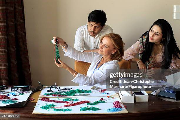 Lucia Silvestri, creative director at Bulgari is photographed evaluating Bulgari jewelry with Monsieur R. And wife for Le Figaro on February 15, 2016...