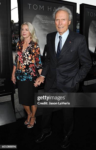 Director Clint Eastwood and Christina Sandera attend a screening of "Sully" at Directors Guild Of America on September 8, 2016 in Los Angeles,...