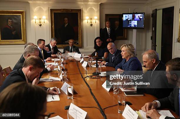 Democratic presidential nominee former Secretary of State Hillary Clinton meets with national security advisors during a National Security Working...