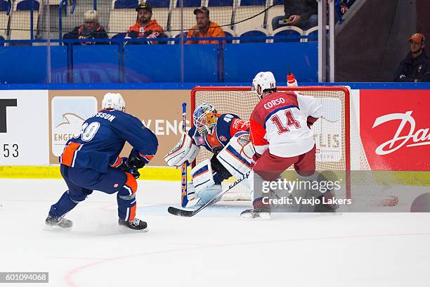 Viktor AndrÃ©n Goaltender of Vaxjo Lakers saves a shot by Daniel Korso of Yunost Minsk during the Champions Hockey League match between Vaxjo Lakers...