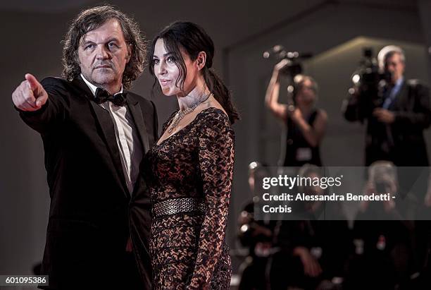 Monica Bellucci and Emir Kusturica attend a premiere for 'On The Milky Road' during the 73rd Venice Film Festival at Palazzo del Cinema on September...