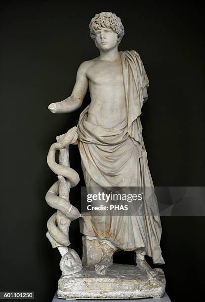 Roman art. Statue of a young Roman depicted as Asklepion. From Campania, Italy. 2nd century AD. Ny Carlsberg Glyptotek. Copenhagen, Denmark.