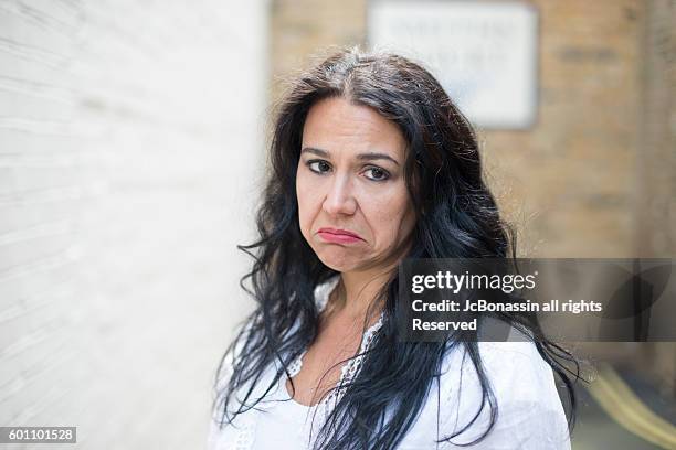 beautiful italian woman with sad face - jc bonassin 個照片及圖片檔