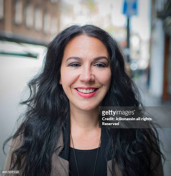 business woman smiling - jc bonassin foto e immagini stock