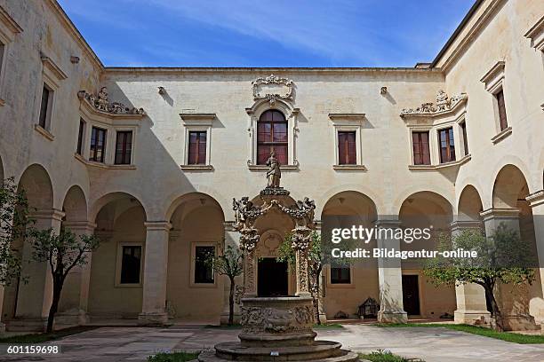 Lecce, the courtyard of the Palazzo del Seminario and the fountain, Puglia, Italy.