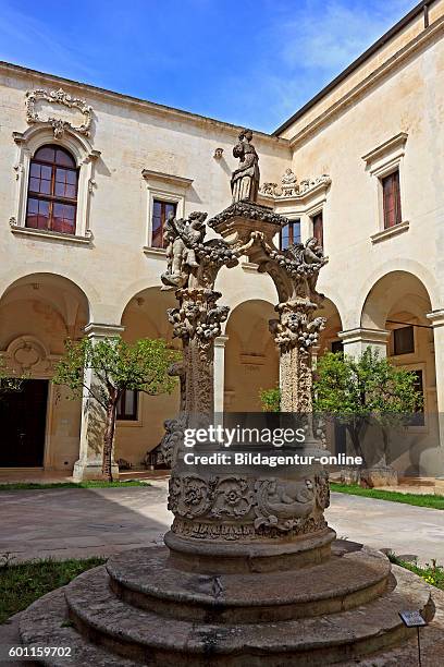 Lecce, the courtyard of the Palazzo del Seminario and the fountain, Puglia, Italy.