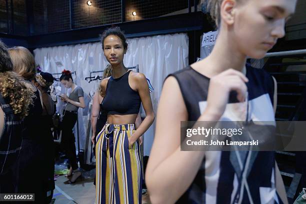 Models prepare backstage during the Milly Fashion Show during September 2016 New York Fashion Week at ArtBeam on September 9, 2016 in New York City.