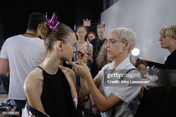 Models prepare backstage during the Milly Fashion Show during September 2016 New York Fashion Week at ArtBeam on September 9, 2016 in New York City.