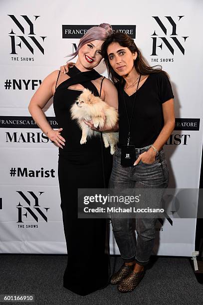 Kelly Osbourne, her dog, Polly, and designer Francesca Liberatore pose backstage at the Francesca Liberatore fashion show during New York Fashion...