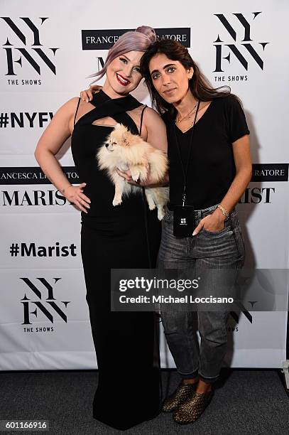 Kelly Osbourne, her dog, Polly, and designer Francesca Liberatore pose backstage at the Francesca Liberatore fashion show during New York Fashion...