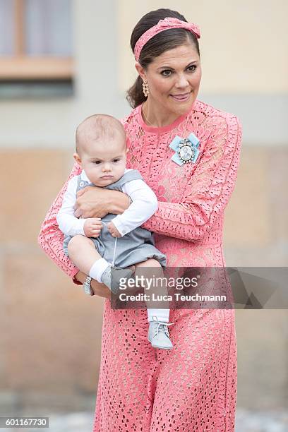 Crown Princess Victoria of Sweden with her son Prince Oscar attend the christening of Prince Alexander of Sweden at Drottningholm Palace Chapel on...