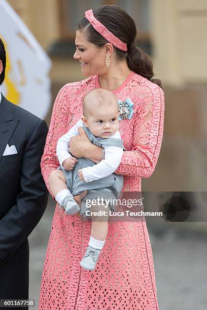 Crown Princess Victoria of Sweden with her son Prince Oscar attend the christening of Prince Alexander of Sweden at Drottningholm Palace Chapel on...