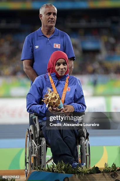 Maroua Brahmi of Tunisia poses on the medals podium after winning the Women's Club Throw - F32 Final on Day 2 of the Rio 2016 Paralympic Games at the...