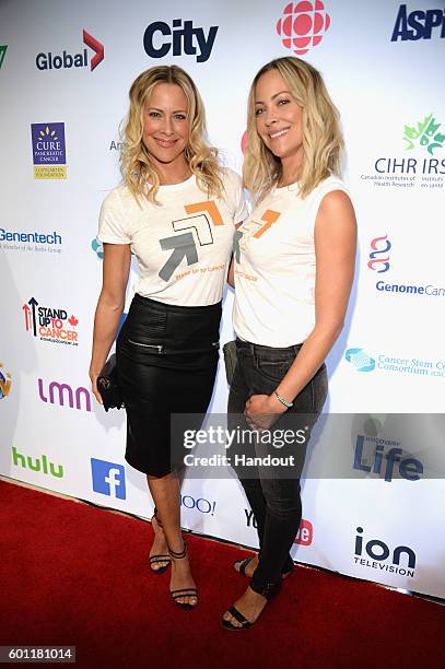 In this handout photo provided by American Broadcasting Companies Inc, actresses Brittany Daniel and Cynthia Daniel attend Stand Up To Cancer , a...