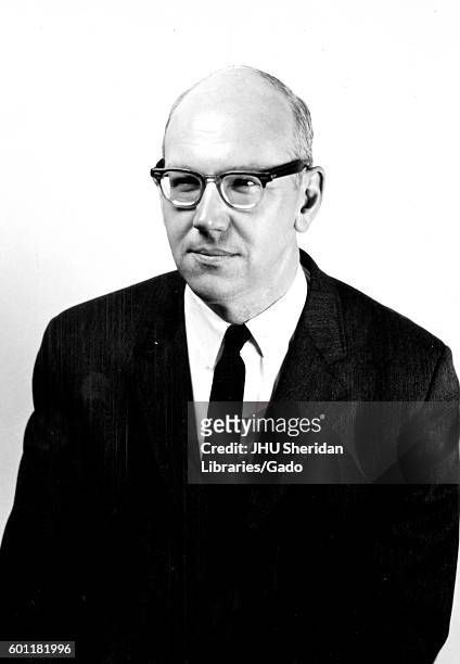 Half length sitting portrait of engineer Elbert Edwin Denhard, Jr, 1965. .