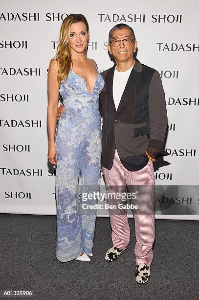 Actress Katie Cassidy and designer Tadashi Shoji pose backstage at the Tadashi Shoji fashion show during New York Fashion Week: The Shows at The Arc,...